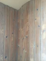 white pickling of knotty pine paneling