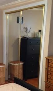 Let's get right to it and kick things off with our inexpensive barn door with mirror and finished closet. Refinishing Gold Mirrored Closet Doors Frugalwoods