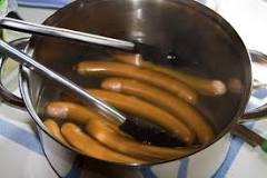 How do you tell if boiled sausage is done?