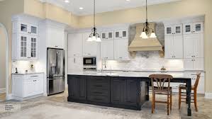 white cabinets and a gray island