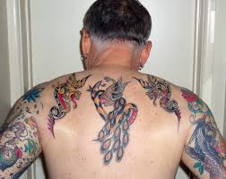 2 Dragons, Peacock and Snake Tattoos | Here's a shot of my u… | Flickr