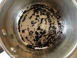 easiest way to clean burnt pots scrub