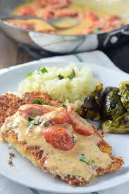 easy make at home parmesan crusted tilapia with tomato basil cream sauce