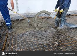pouring concrete slab stock photo by