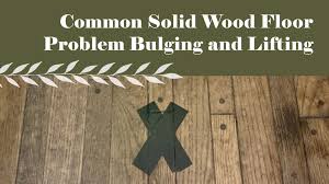 common solid wood floor problem bulging