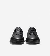 Cole haan eliminated all of the unnecessary weight of traditional court shoes without sacrificing the principles of flexibility, cushioning and ergonomics. Men S Grandpro Tennis Sneaker In Black Black Cole Haan Us
