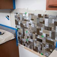 Wallpaper does not make for a good bonding surface; Installing A Tile Backsplash