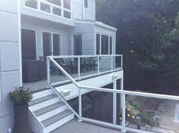 Manufactures waterproof decking, aluminum decking, aluminum deck railing, aluminum fence, privacy fencing, pergolas and deck framing. Aluminum Railing By Nexan Maryland Custom Outdoor Builder Decks Porches Patios And More