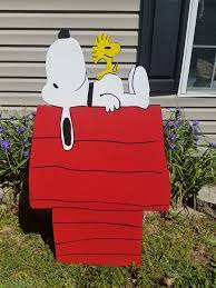 Snoopy Woodstock On Doghouse