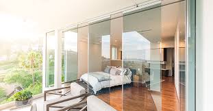 Bedroom With Bi Fold Frameless Glass