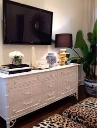 cute way to decorate under a mounted tv