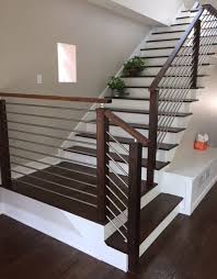 Is that banister is the handrail on the side of a staircase while railing is a fence or barrier consisting of one or more horizontal rails and vertical supports. Modern Stair Railing Span Stainless Steel Span Stair Parts
