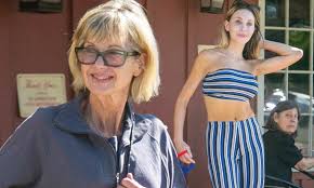 'thank you mama and james and papa and amazon dad and peanut and jelly for your unwavering love and support. Olivia Newton John Appears In High Spirits As She Enjoys A Day Out With Daughter Chloe Lattanzi Daily Mail Online