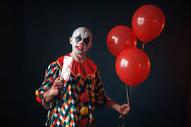 ugly clown with meat cleaver