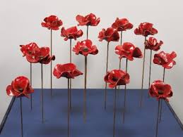 six ceramic poppies from blood
