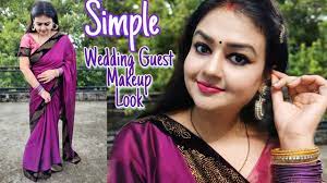 purple saree wedding guest makeup