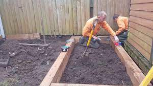 how to build raised beds using railway