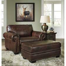 The grand scale harrison leather chair and a half is defined by opulence and luxury. Signature Design By Ashley Roleson Chair And A Half And Ottoman With Nailhead Trim Royal Furniture Chair Ottoman Sets