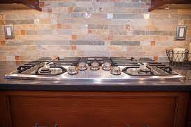 Fire and ice is a sealed prophecy. Installing Tile Backsplash For A Traditional Kitchen With A Countertop And Fire Ice Backsplash With Design Build Pros By Best Tile Homeandlivingdecor Com