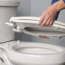 how to remove a bemis toilet seat