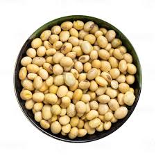 raw dried soybeans in round bowl
