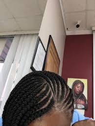 madusas african hair braiding 1125 e