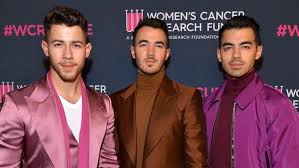 Coming back together in 2012 they toured the world before splitting for six years. Jonas Brothers Release New Holiday Ballad I Need You Christmas Entertainment Tonight