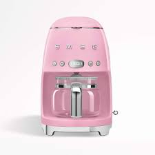 Appliances that embody the glamour and rounded forms of the 1950's. Smeg Pink Drip Coffee Maker Crate And Barrel