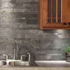 Travertine tiles form a more traditional backsplash while a creative medallion behind the range adds an unexpected twist. Stone Backsplash Tiles Aspect