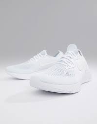 Nike epic react flyknit running trainers gym triple white uk size 10 (eur 45). Nike Running Epic React Flyknit Trainers In Triple White Aq0067 102 Asos