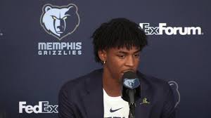 A photo of ja morant's mom surprised for getting a new car. Grizzlies Ja Morant News Conference Best Quotes