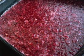 cranberry salad in raspberry jello with