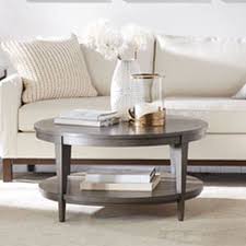 A smaller wooden coffee table can give your room a very traditional look, depending on which model you pick. Glenavon Round Coffee Table Round Wood Coffee Table Coffee Table Living Room Coffee Table Small Coffee Table