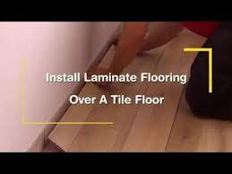 install laminate flooring over a tile