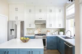 white and blue kitchen cabinets with