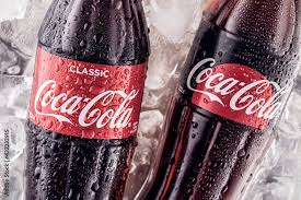 coca cola logo on clic cola bottles