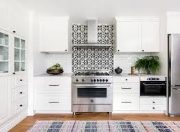It bears the same visual strength of a stone backsplash but contributes less to closing off the space. 21 White Kitchen Cabinets Ideas For Every Taste