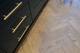 Find out the best kind of flooring for your kitchen. Shaker Kitchen Design And Herringbone Wood Floors Design Inspiration