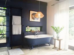 This tiny bathroom is made to feel much larger by the inclusion of mirror all around the room. 9 Navy Blue Bathroom Ideas