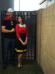 What costume could be more perfect for a couple with a new baby at halloween? Diy Popeye And Olive Oyl Costume Halloween Costumes To Make Clever Couples Halloween Costumes Olive Oyl Costume