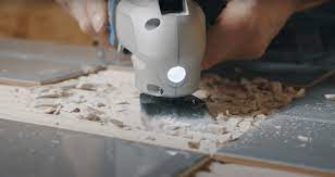remove tile adhesive with a multi tool