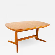 Whether you're throwing an elaborate dinner party or just inviting a few friends over for a casual meal, setting a table can be a tricky endeavor.v161256_b01. D Scan Mid Century Teak Hidden Leaf Dining Table