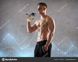 Young Man Or Bodybuilder With Protein Shake Bottle Stock