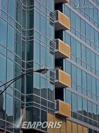 Glass Curtain Wall And Balconies On The