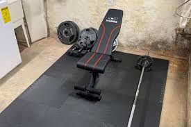 Basement gym, crossrope, home gym, locker bench, ultimate sandbag, waterrower; How To Build A Rowhouse Basement Gym For At Home Workouts