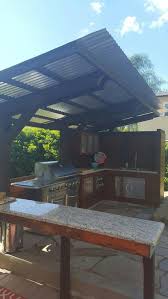 The only appliance in this kitchen is the grill. Pin On Courtyards