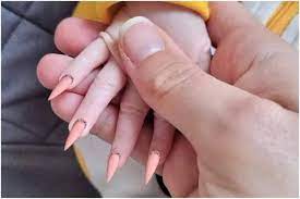 viral photo of baby with fake nails