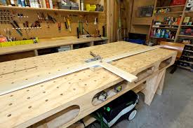 A table saw consists of a circular saw blade which protrudes through the surface of a table, the table provides support for. The Ultimate Work Bench Thisiscarpentry