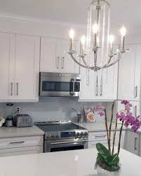 6 Bright Kitchen Lighting Ideas See How New Fixtures Totally Transformed These Spaces Bright Kitchen Lighting Bright Kitchens Kitchen Ceiling Lights