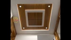 wood polish design on false ceiling